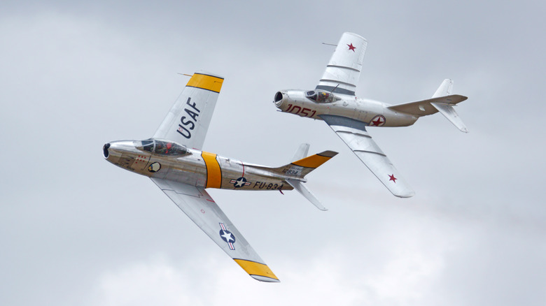 F-86 Sabre flying alongside MiG-15