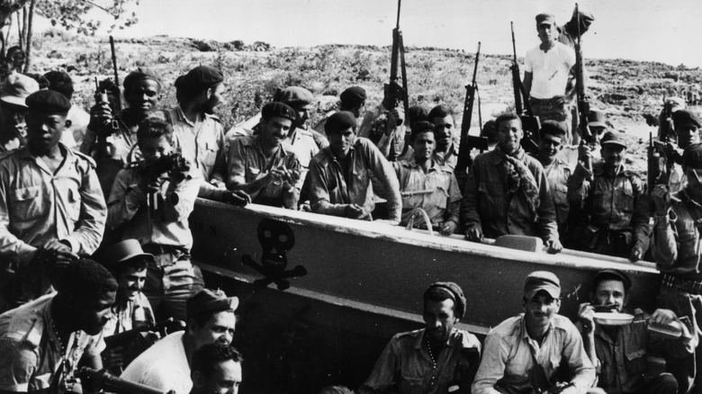 Castro militiamen and members of the Revolutionary Army celebrating Bay of Pigs victory