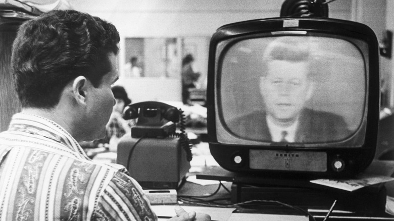 Cuban refugee watches President Kennedy's TV address October 22nd