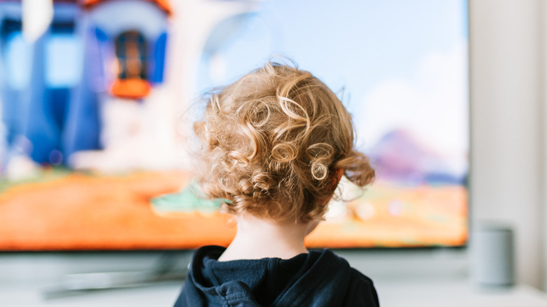 little child watching tv