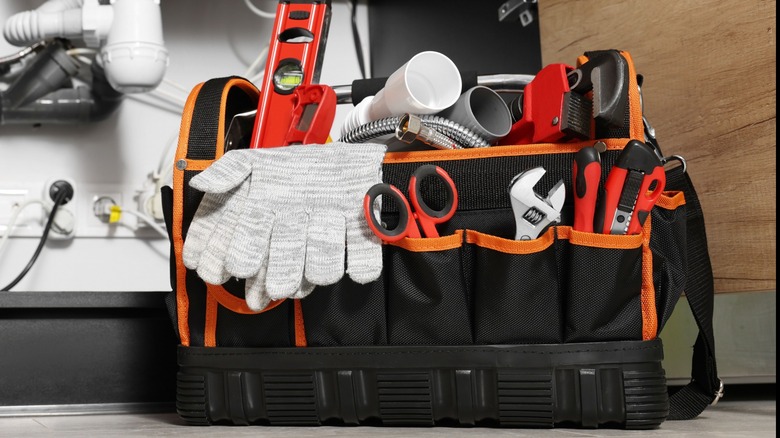 assorted tools in tool bag