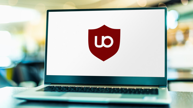 uBlock origin logo on a laptop screen