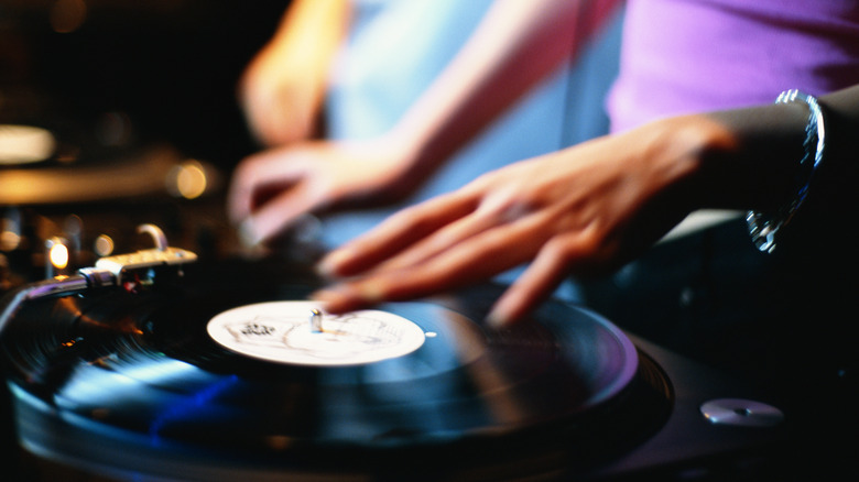 Hand scratching on vinyl DJ setup