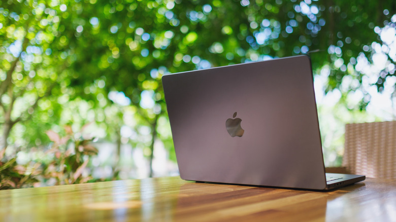 Apple MacBook Pro on a table outdoors