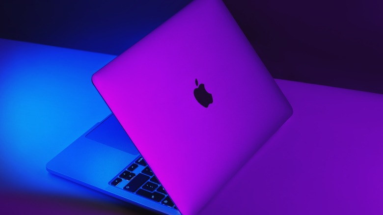 MacBook in purple lighting