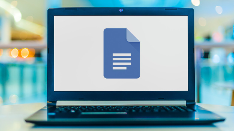 Google Docs logo on a laptop screen