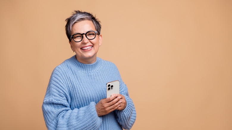 lady holding iPhone