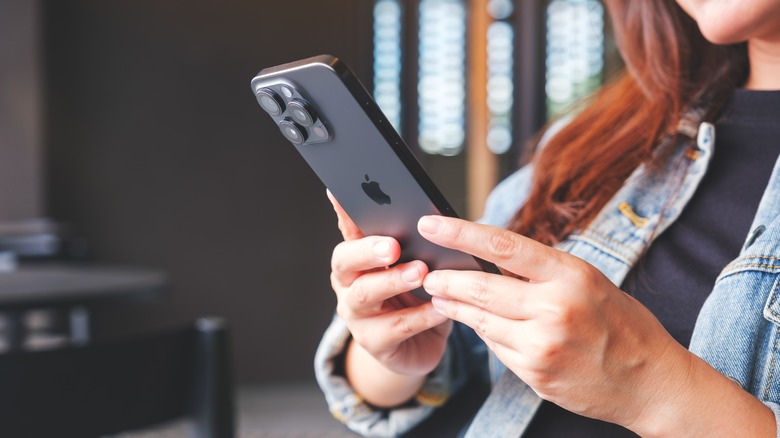 woman holding iphone