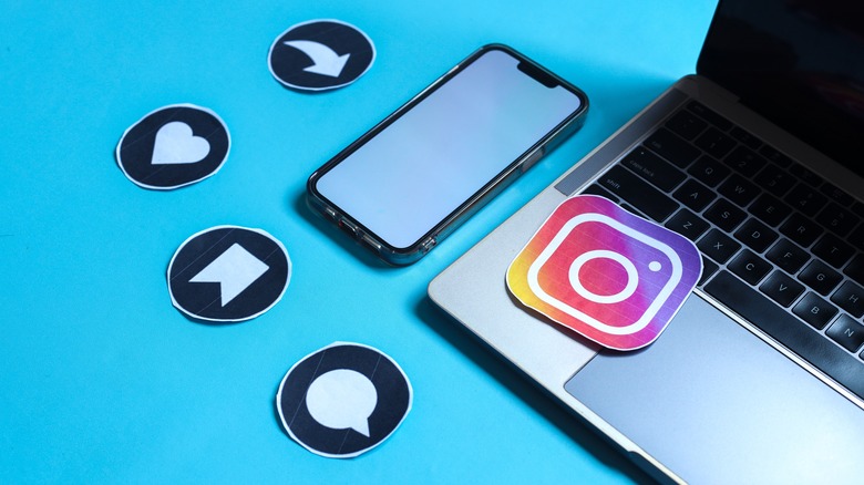 instagram icons on laptop and phone