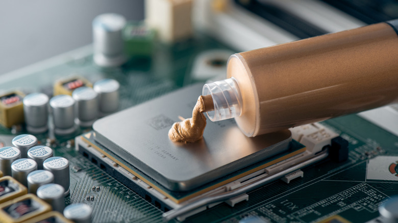 Thermal paste being applied to a CPU