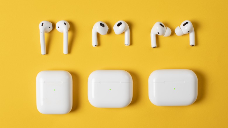 AirPods models on yellow table