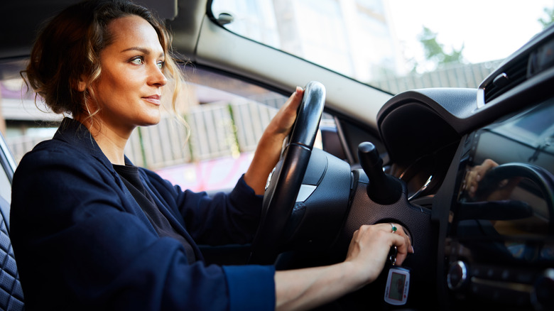 woman starting car