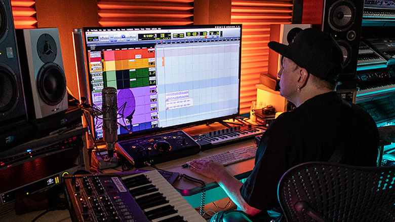 musicians use Pro Tools in a studio