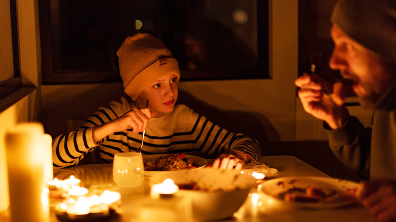 Candlelit dinner during power outage