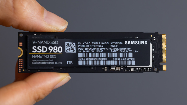 A Samsung SSD held in hand