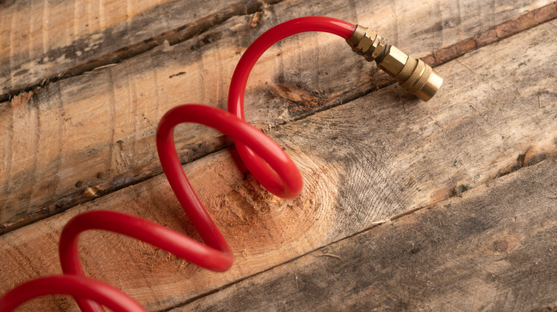 Compressed air hose on table