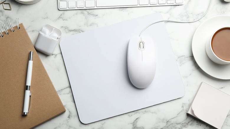 white mouse on white mousepad