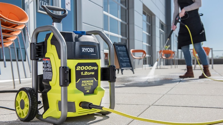 Ryobi pressure washer on sidewalk