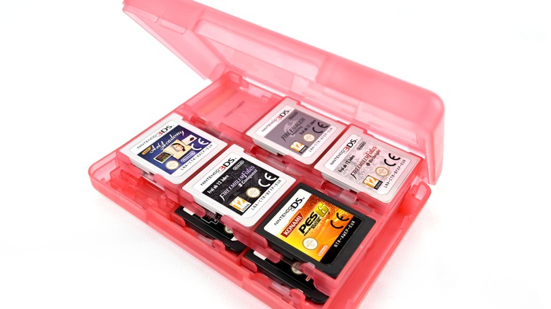 Nintendo DS cartridges in pink case