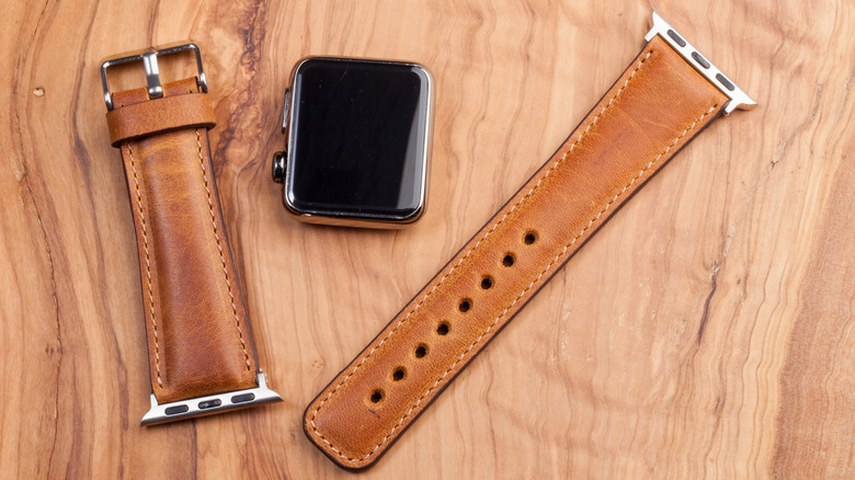 Unassembled Apple Watch with leather strap