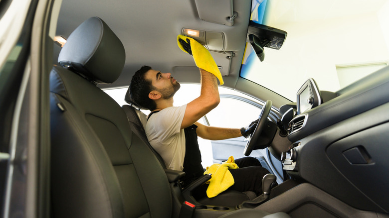 cleaning car headliner with towel