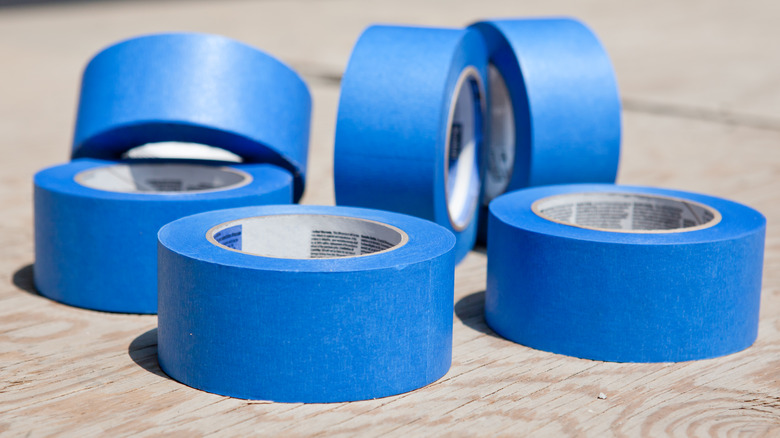 Multiple rolls of blue painter's tape