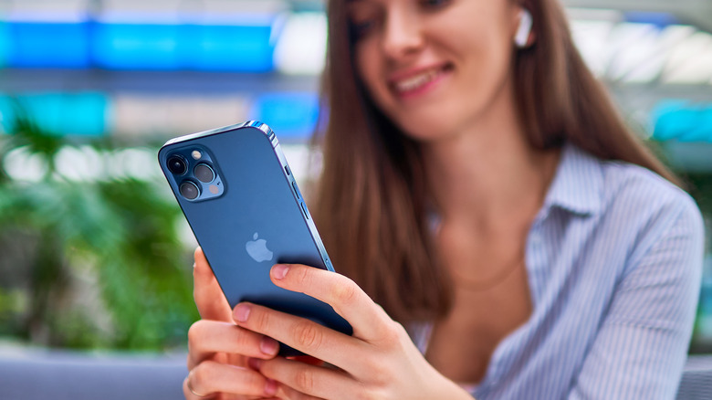 Woman browsing on iPhone