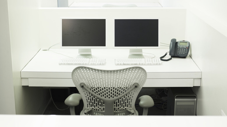 Two monitors on a desk