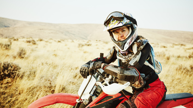 woman wearing a dirt bike helmet