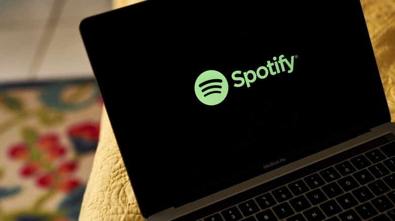 Spotify logo on laptop screen