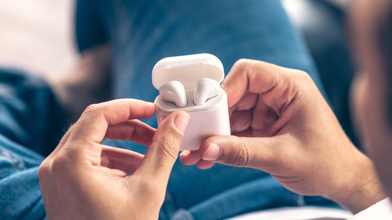 AirPods 2nd generation in hand