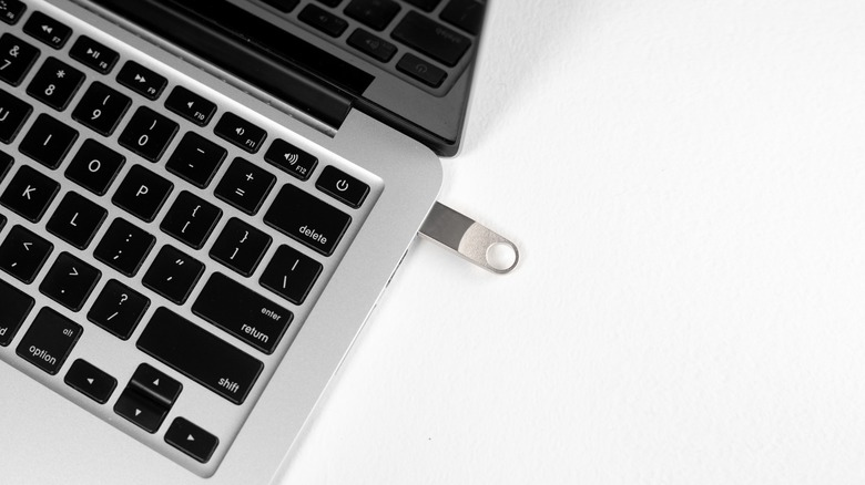 Thumb drive connected to a MacBook