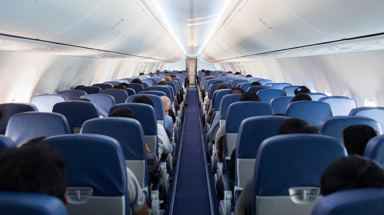 Center aisle of passenger airplane