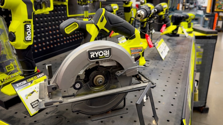 Ryobi saw and other tools on display.