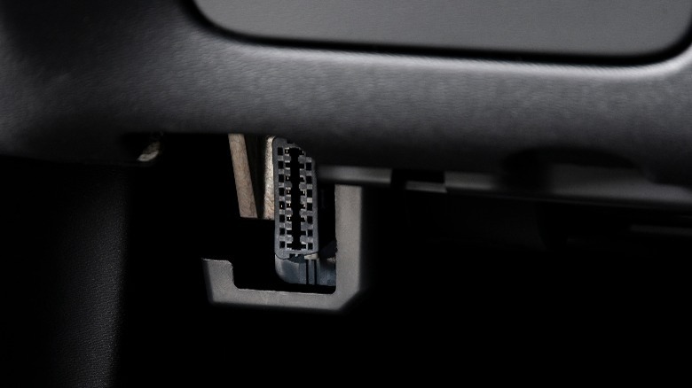 On-Board Diagnostic II (OBD II) port located in the passenger-side footwell