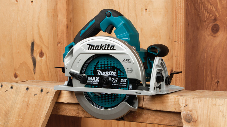 Makita circular saw sitting on a piece of wood