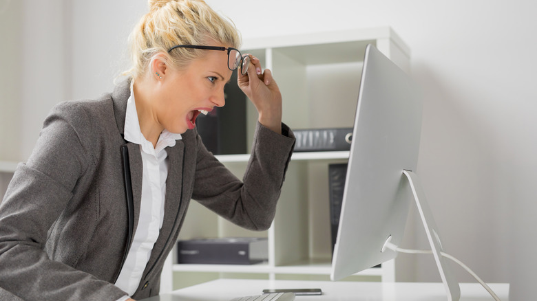 Person screaming at iMac