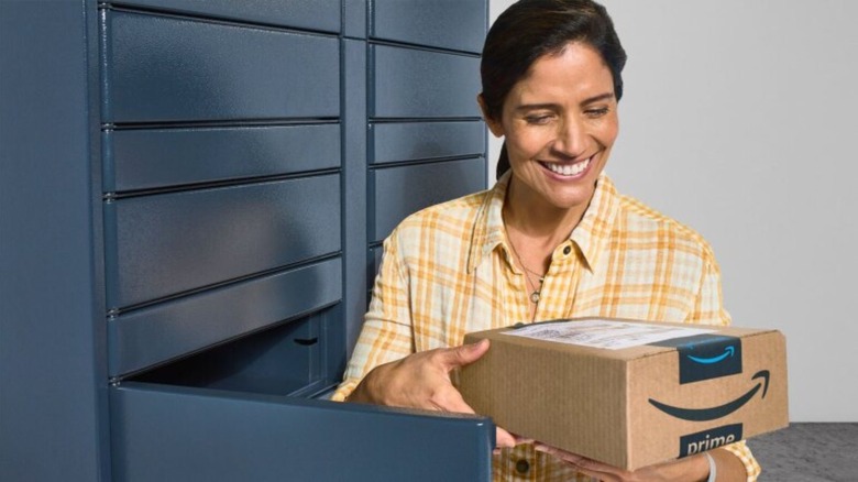 Woman smiling while picking up her Amazon package