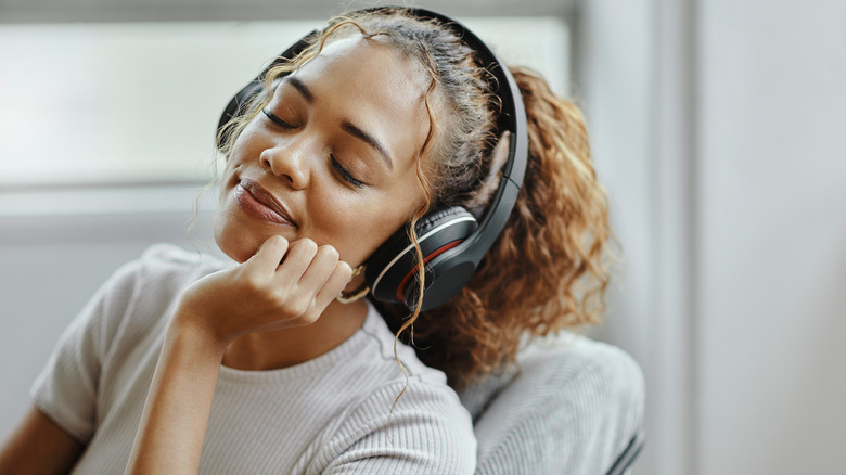 woman listening with headphones