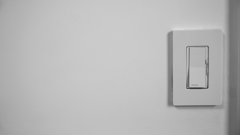 light dimmer switch on wall