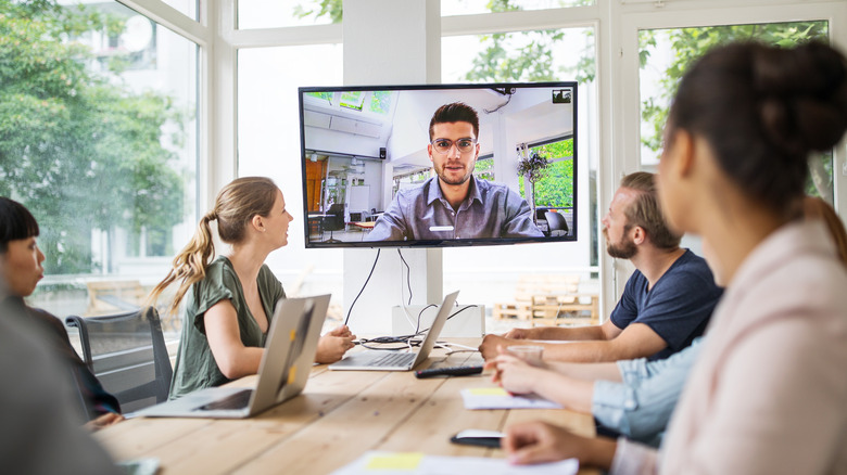 Office conference with TV screen