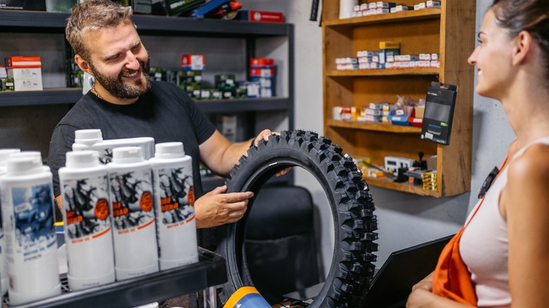 Customer shopping for motorcycle tire