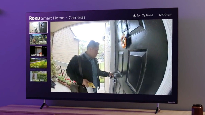 Man at door in Roku doorbell camera feed on TV screen