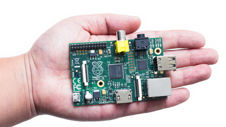 Someone holding raspberry pi