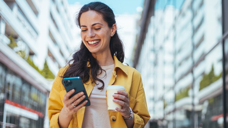 A woman using an iPhone