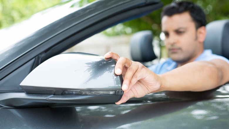 driver adjusting mirror