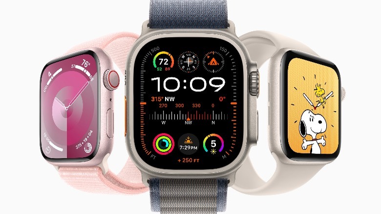 Three Apple Watches with different faces