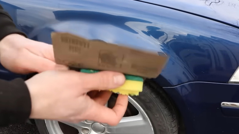 wet sanding the clearcoat of a rust repair