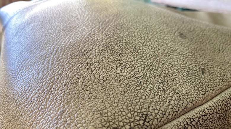 Dirty leather car seat