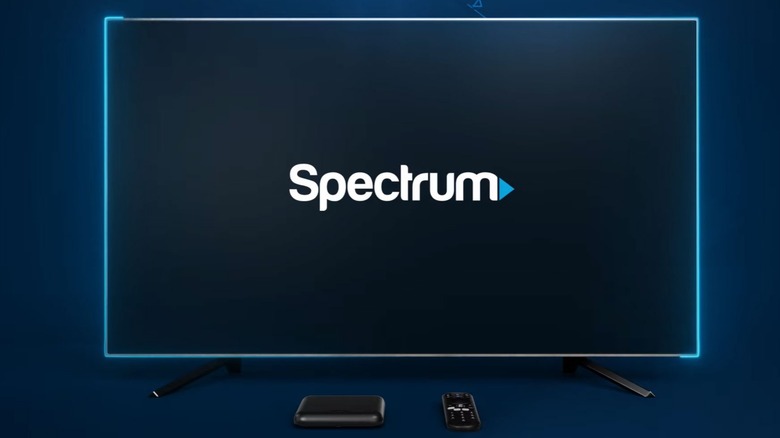 Spectrum remote next to TV menu